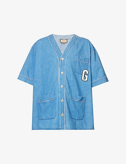 GUCCI: Logo-patch relaxed-fit denim shirt