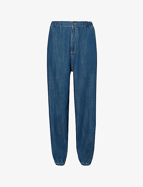 GUCCI: Mid-wash tapered-leg relaxed-fit jeans