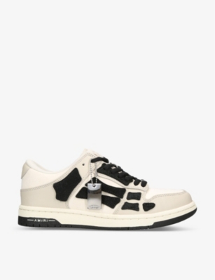 AMIRI - Skel panelled leather low-top trainers | Selfridges.com