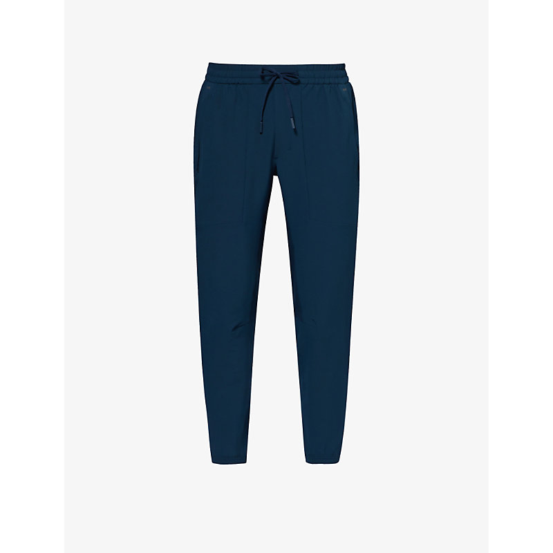Lululemon Mens True Navy License To Train Tapered-leg Stretch Recycled-polyester Jogging Bottoms