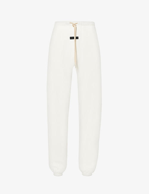 FEAR OF GOD ESSENTIALS: ESSENTIALS brand-print relaxed-fit cotton-blend jogging bottoms