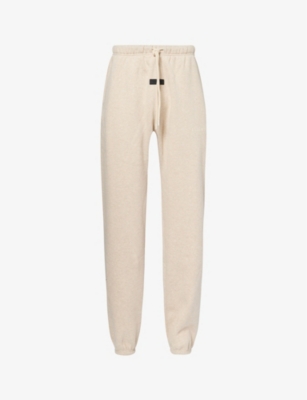 FEAR OF GOD ESSENTIALS: ESSENTIALS brand-print relaxed-fit cotton-blend jogging bottoms