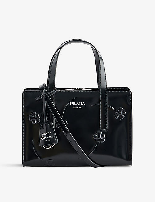 PRADA: Re-edition Mini 1995 leather top-handle bag