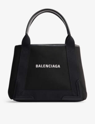 BALENCIAGA - Logo-print canvas tote bag | Selfridges.com