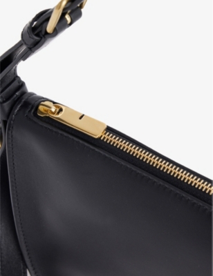 Shop Burberry Shield Metallic-charm Leather Shoulder Bag In Black