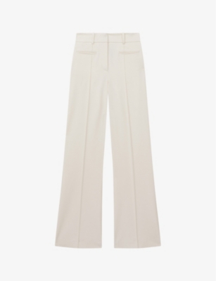 Reiss Claude Pinched-seam Flared-leg High-rise Stretch-woven Trousers In Cream