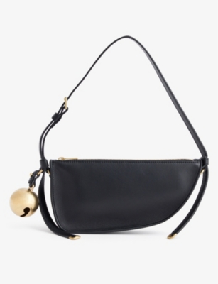 Shop Burberry Women's Black Shield Metallic-charm Leather Shoulder Bag