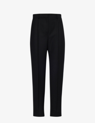 Shop Totême Pressed-crease Tapered Mid-rise Recycled-polyester And Wool-blend Trousers In Black 200