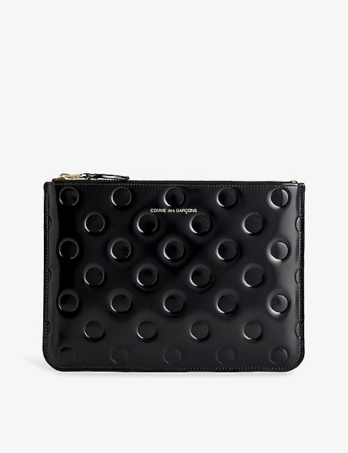 COMME DES GARCONS: Polka-dot embossed leather pouch