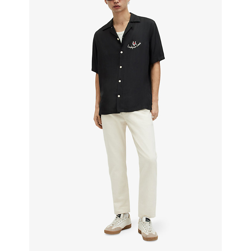 Shop Allsaints Chanceux Text Heart-embroidered Relaxed-fit Woven Shirt In Jet Black