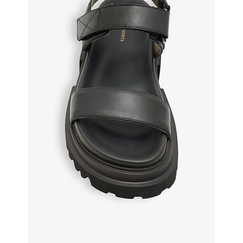 Shop Allsaints Rory Brand-patch Flat Leather Sandals In Black