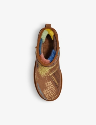 Ugg X The Elder Statesman Classic Ultra Mini Genuine Shearling Lined Bootie In Dk.brn Com