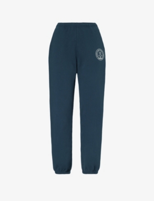 Sporty And Rich Central Park Branded-print Cotton-jersey Jogging Bottoms In Navy