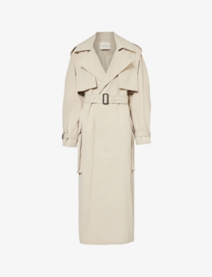 Jourdan Sloane in a classic Burberry trench coat and a statement