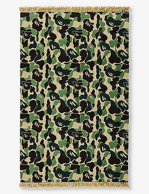 A BATHING APE: Ape Head camouflage woven rug 194cm x 138cm