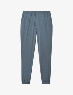 Shop Reiss Men's Steel Blue Rival Regular-fit Tapered-leg Stretch-nylon Trousers