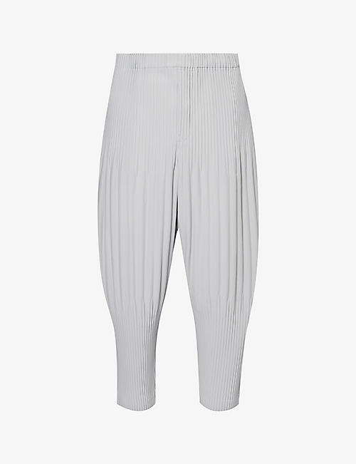 HOMME PLISSE ISSEY MIYAKE: Basic pleated tapered-leg knitted trousers