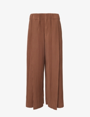 HOMME PLISSE ISSEY MIYAKE: Pleated drawstring-waistband wide-leg regular-fit knitted trousers