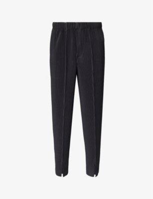 HOMME PLISSE ISSEY MIYAKE: Pleated tapered-leg regular-fit knitted trousers
