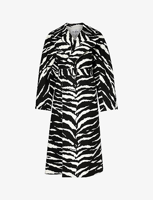 ALAIA: Animal-print belted cotton trench coat