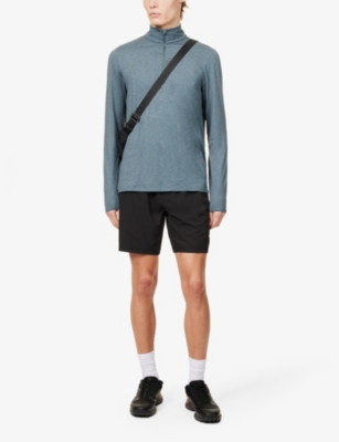 Shop Vuori Men's Lake Heather Ease Half-zip Relaxed-fit Stretch-woven Sweatshirt In Blue
