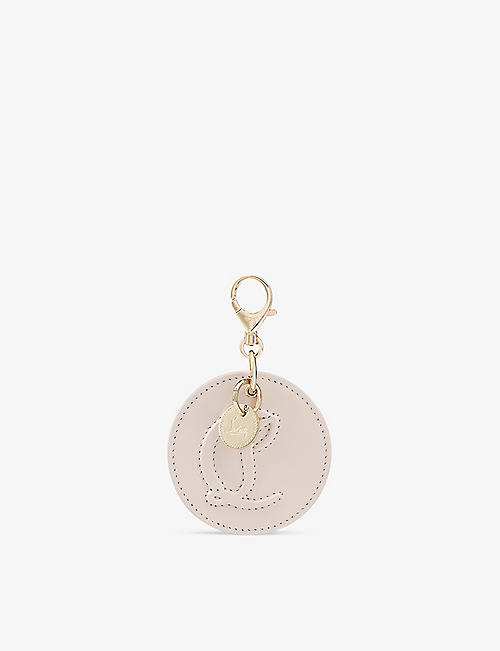 CHRISTIAN LOUBOUTIN: Logo-embossed leather and brass bag charm