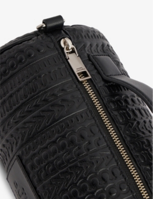 Shop Marc Jacobs The Monogram Debossed Duffle Bag In Black