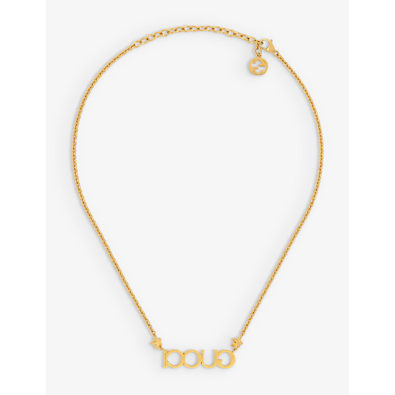 Shop Gucci Women's Yellow Gold Logo-script Embellished Antique Gold-toned Metal Bracelet