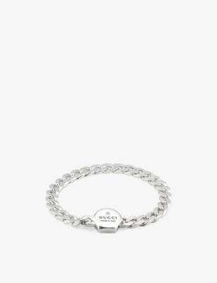 GUCCI: Trademark logo-engraved sterling silver bracelet