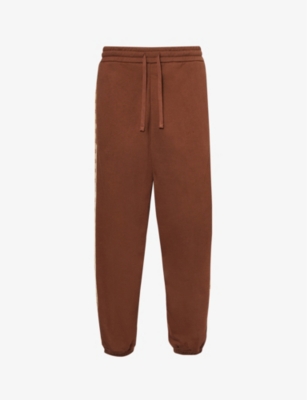 Gucci Monogrammed Panelled Cotton-jersey Jogging Bottoms In Brown/mix