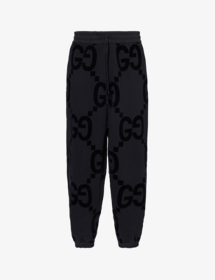 Gucci Monogram-pattern Relaxed-fit Cotton-jersey Jogging Bottoms In Black/mc
