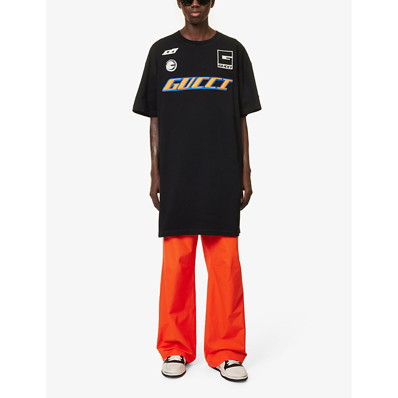 Shop Gucci Men's Black/multicolor Brand-appliqué Longline Cotton-jersey T-shirt