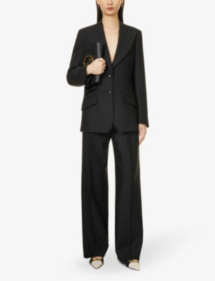 Shop Gucci Women's Black Monogram-pattern Pleated Mid-rise Wool Trousers