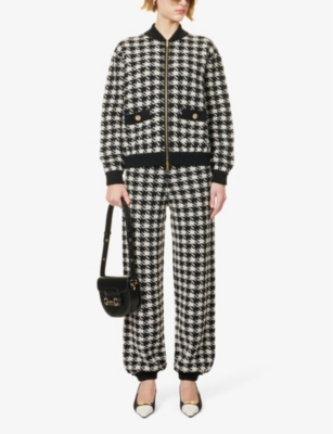 Shop Gucci Women's Black Ivory Elasticated-cuff Houndstooth-pattern Wool Trousers In Monochrome