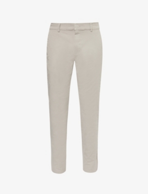 ARNE: Tapered-leg mid-rise stretch-cotton trousers