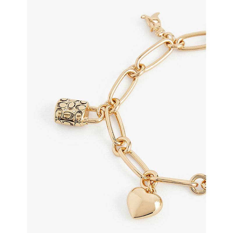 Shop Coach Womens Gold Iconic Brass And Cubic Zirconia Charm Bracelet