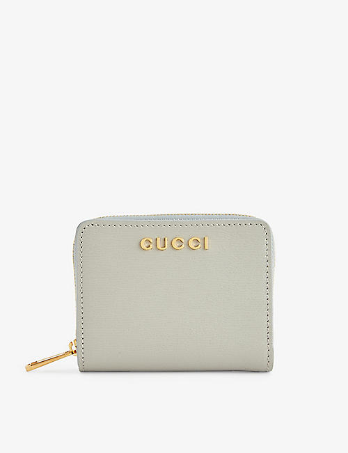 GUCCI: Logo-plaque leather wallet