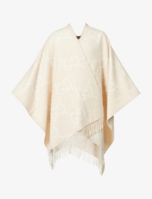 GUCCI: Monogram-pattern fringed-trim cashmere cape