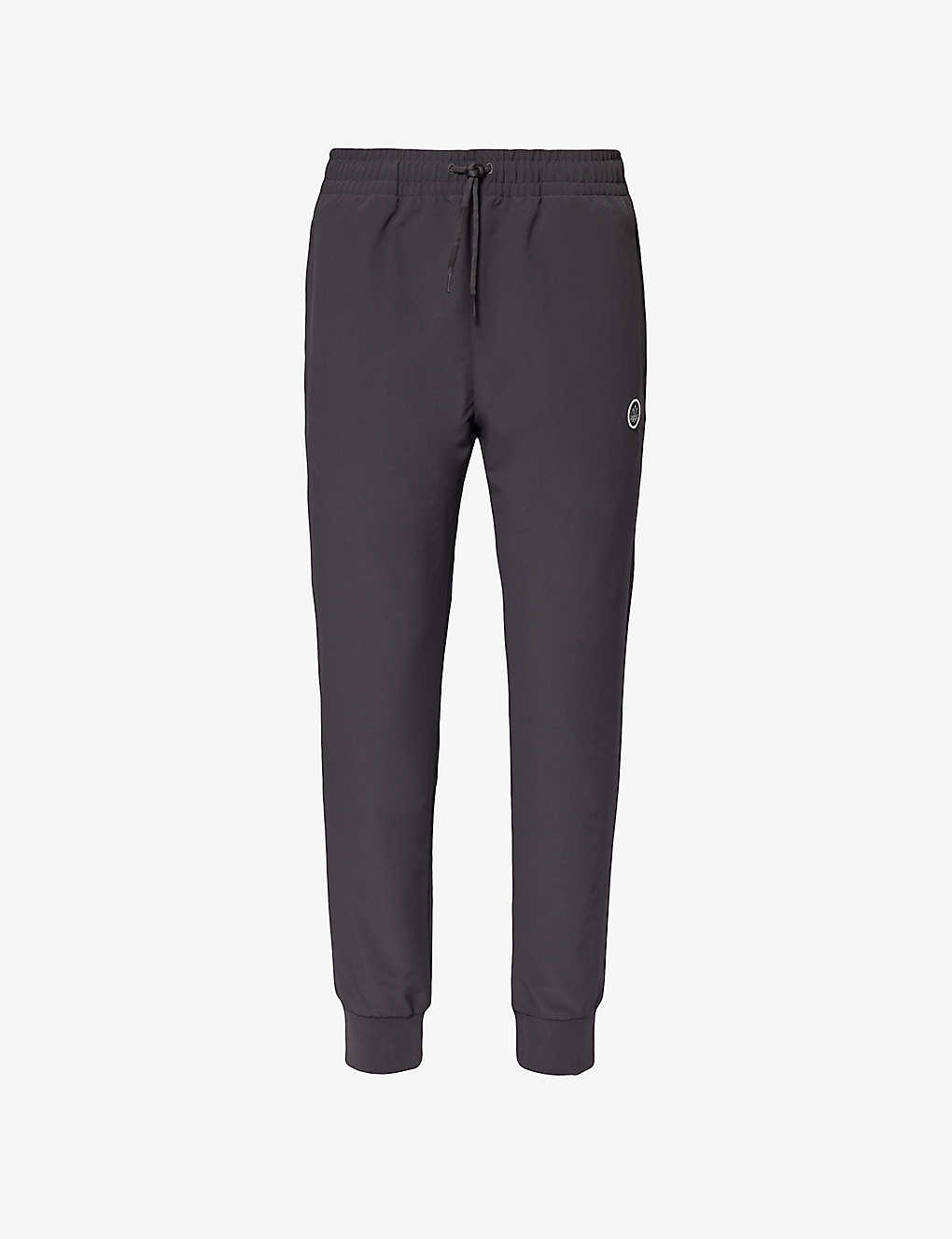 Adidas Statement Suddell Brand-embellished Recycled Polyester-blend Jogging Bottoms In Utility Black