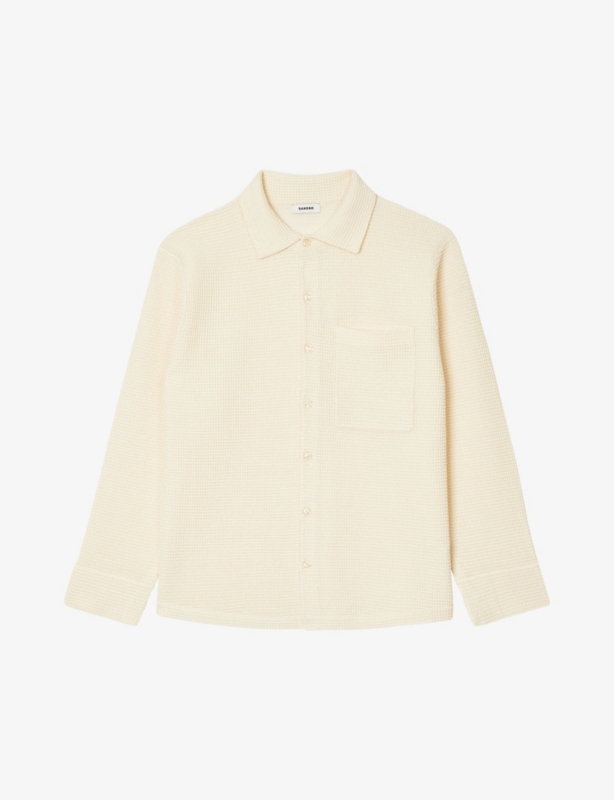 Patch-pocket oversized knitted shirt