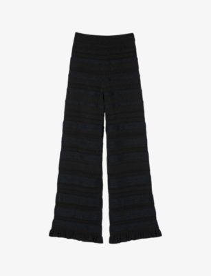 Sandro Womens Noir / Gris Ruffle-trim Flared-leg Stretch-knit Trousers