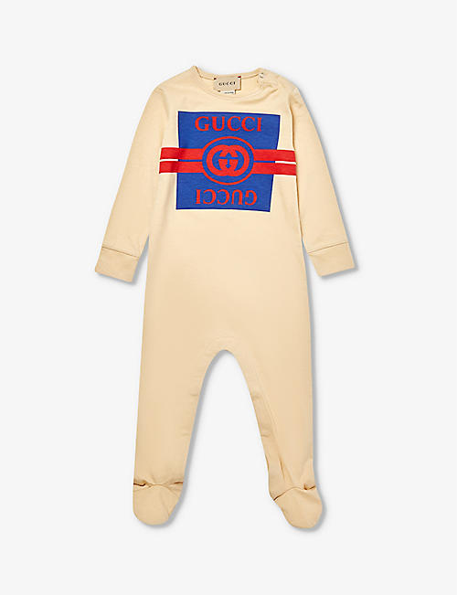 GUCCI: Striped logo-print cotton-jersey babygrow 0-12 months