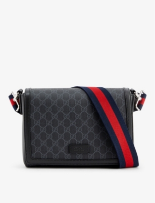 GUCCI Monogram pattern coated canvas cross body bag Selfridges