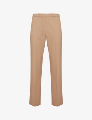 GUCCI: Monogram-embellished tapered-leg woven trousers