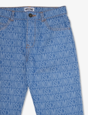 Shop Moschino Girls Denim Allover Logo Kids Brand-print Straight-leg Jeans 10-14 Years