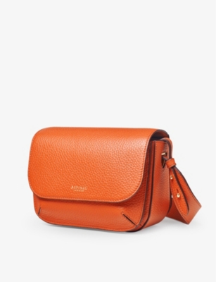 Shop Aspinal Of London Women's Orange Ella Logo-embossed Leather Cross-body Bag