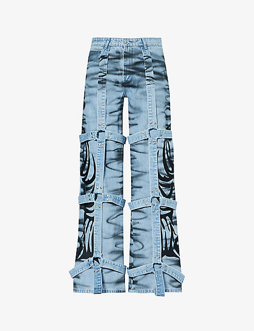 WHO DECIDES WAR BY EV BRAVADO: Bondage-overlay embroidered wide-leg jeans