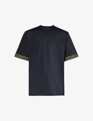 Shop Versace Men's Black Gold Greca-trim Oversized Swim Top