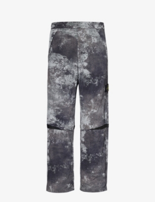 Shop Stone Island Dissolve Camouflage-pattern Shell Trousers In Grey