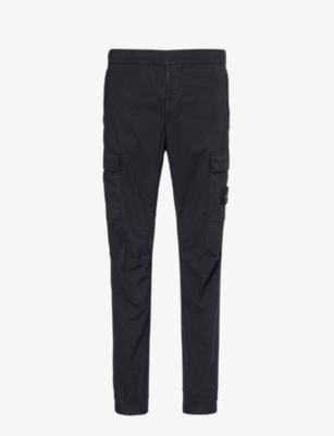 STONE ISLAND: Logo-badge tapered-leg stretch-cotton cargo trousers